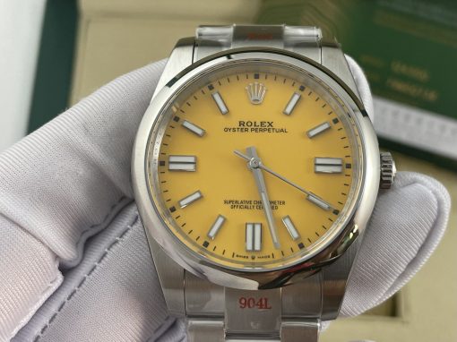 ساعه رولكس اويستر ماكينه سويسريه باللون الفضي ارضيه لون اصفر ROLEX Oyster